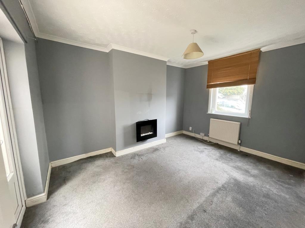 Lot: 10 - TWO-BEDROOM MAISONETTE - Dining room with grey walls and grey carpet